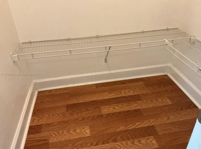 a view of a car parked in front of a house