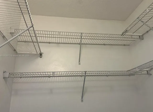 a view of a building with a yard