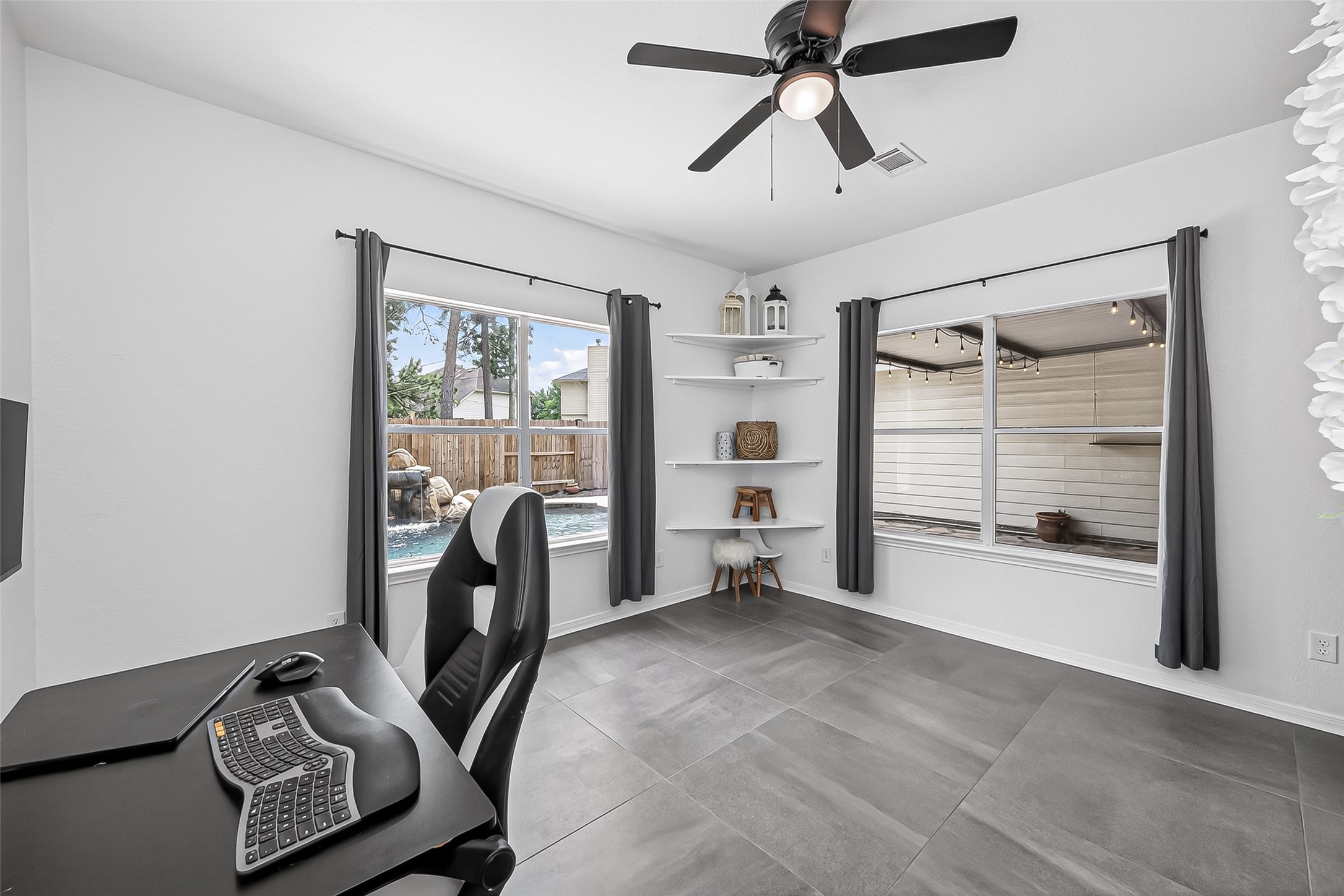7411 Stonesfield Place Spring, TX 77389 - Photo 18 of 43 1st Floor - Office - Can be used as a sixth bedroom. It faces the pool and patio.High efficiency ceiling fans installed for maximum airflow and lower energy consumption.