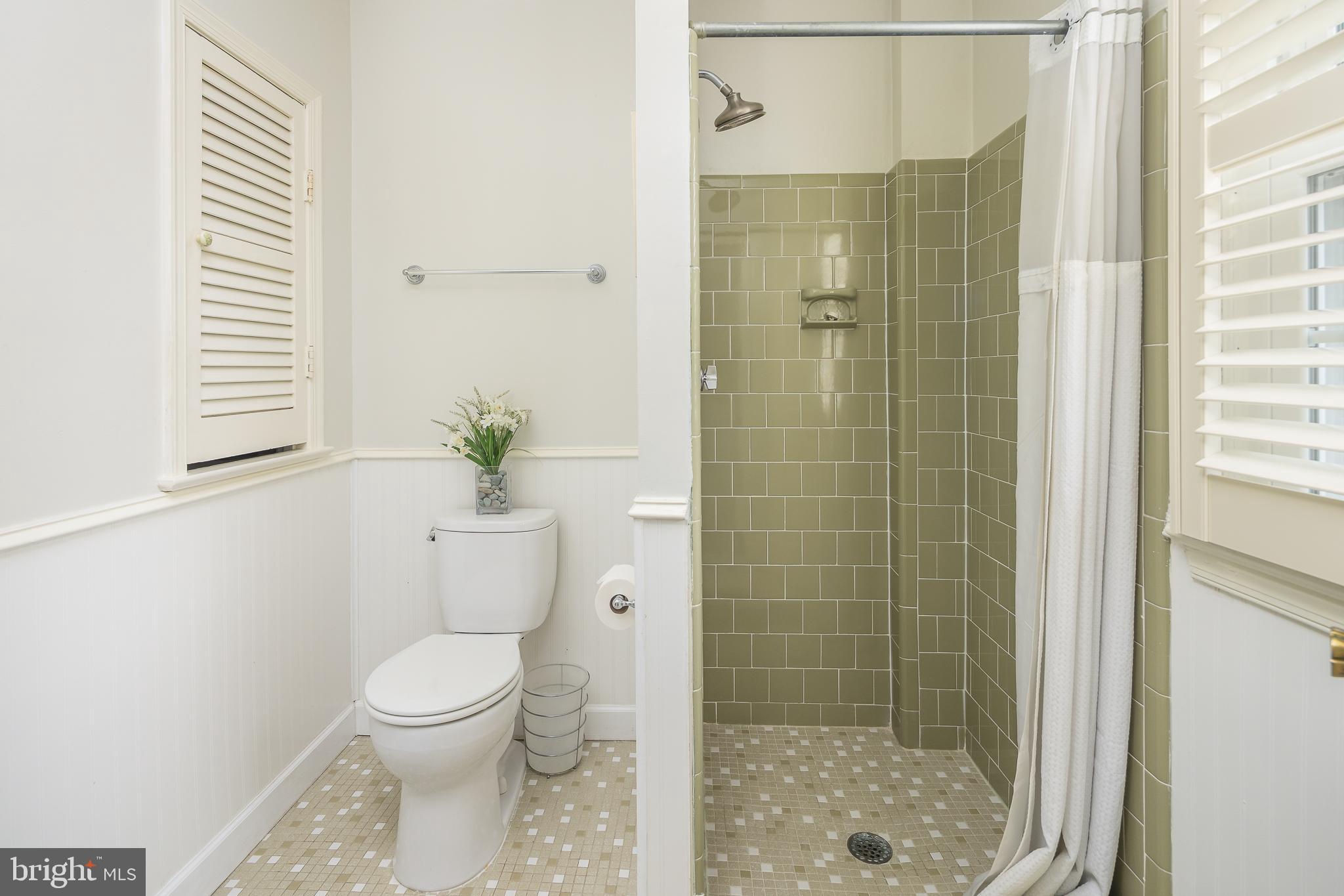 6311 Golf Course Square Alexandria, VA 22307 - Photo 14 of 39 a bathroom with a toilet and shower