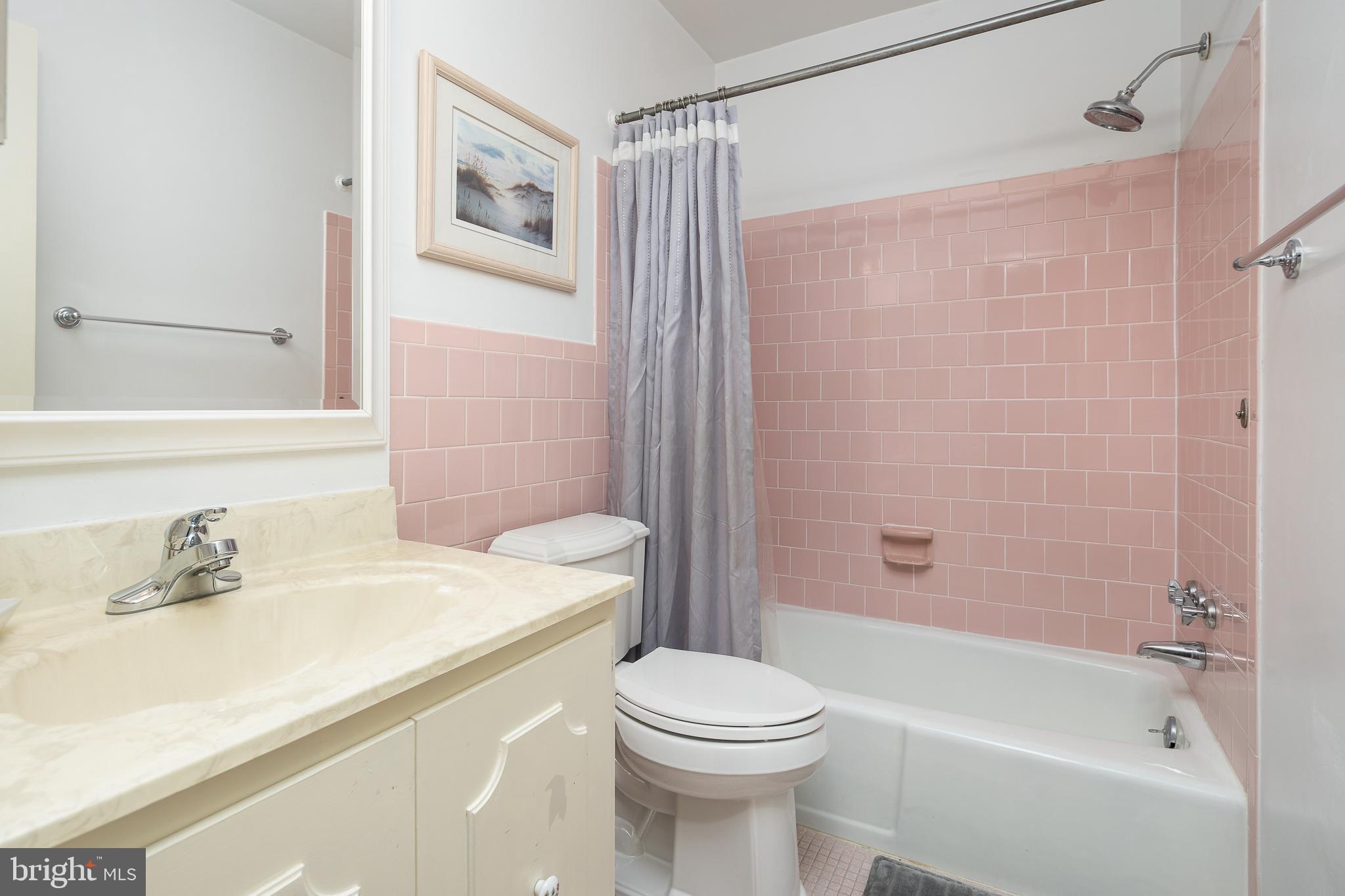 6311 Golf Course Square Alexandria, VA 22307 - Photo 20 of 39 a bathroom with a sink toilet and shower