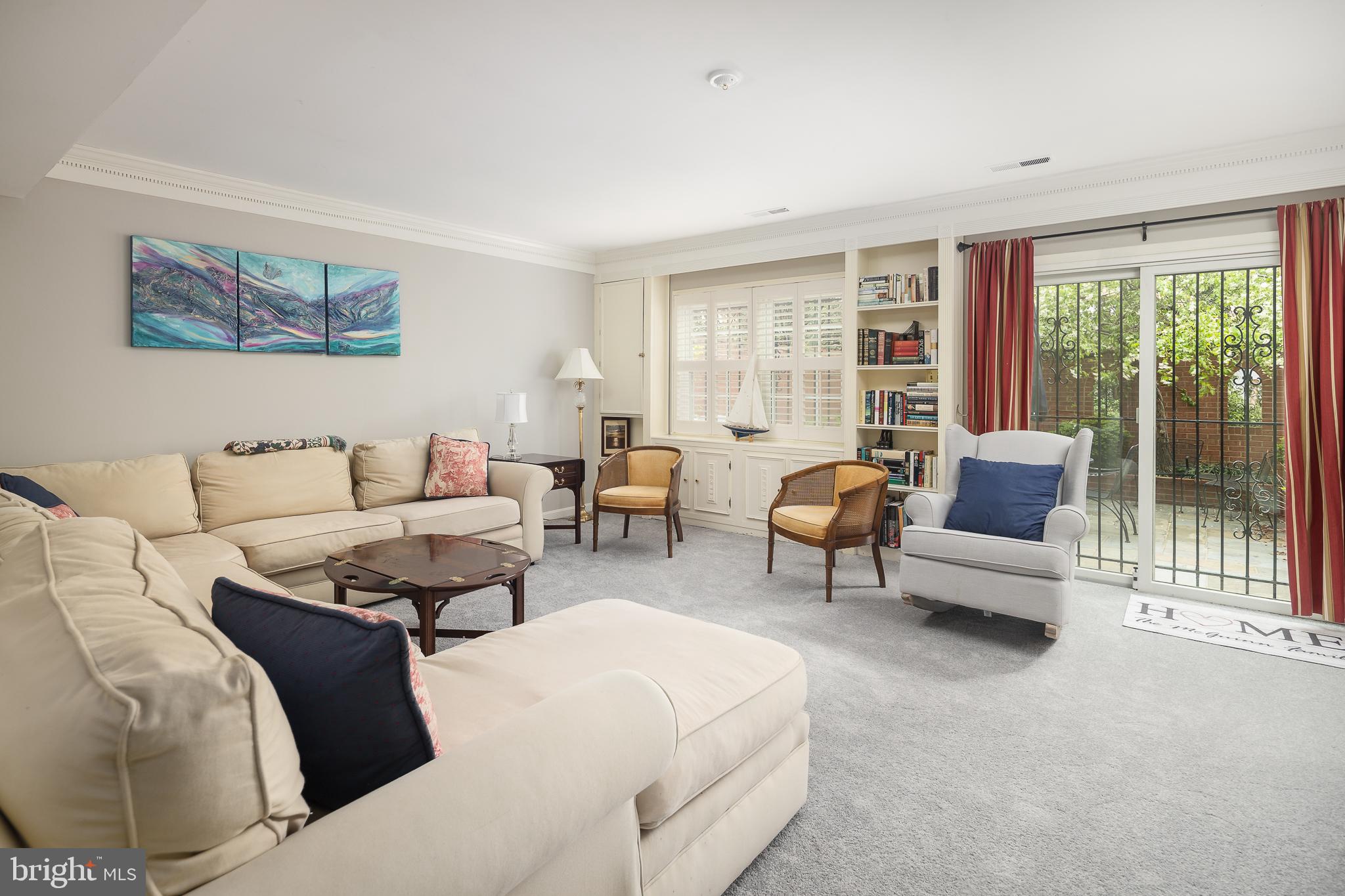 6311 Golf Course Square Alexandria, VA 22307 - Photo 21 of 39 a living room with furniture and a large window