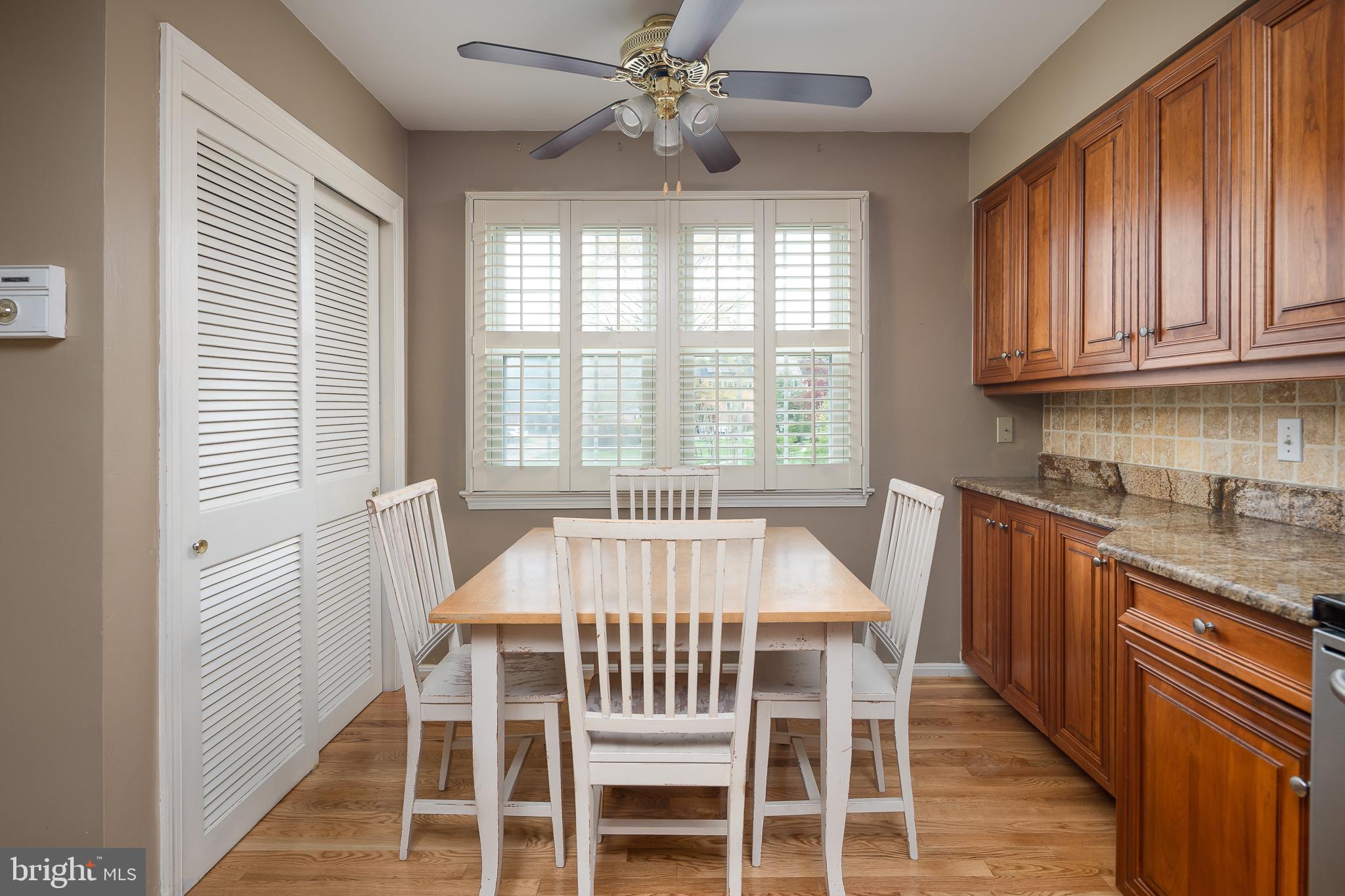 6311 Golf Course Square Alexandria, VA 22307 - Photo 4 of 39 a view of a dining room with furniture window and outside view