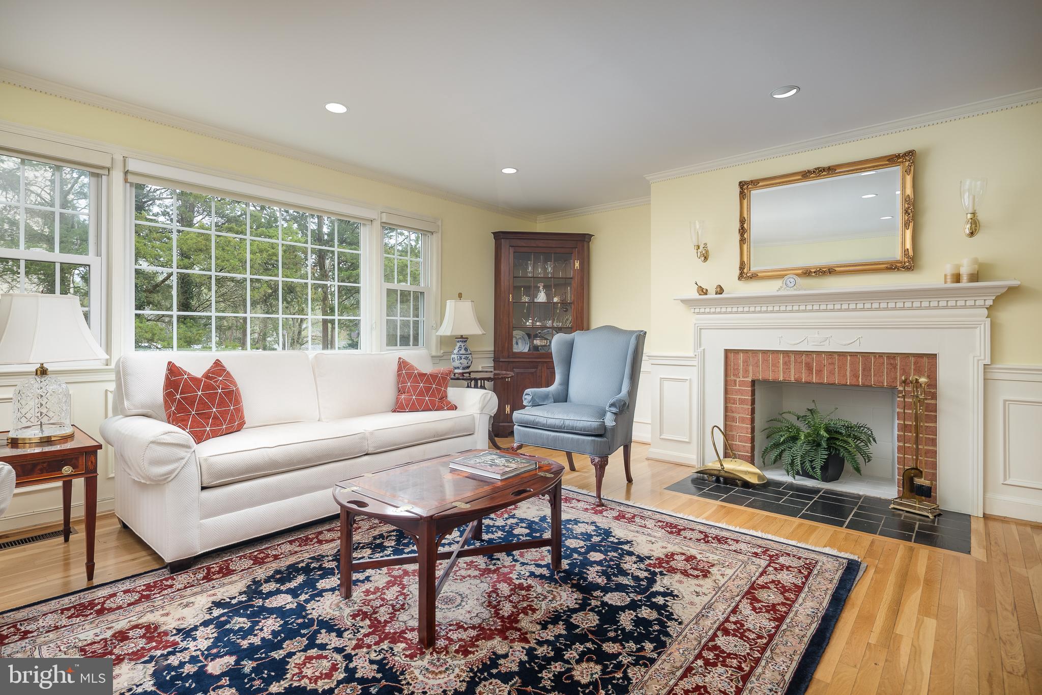 6311 Golf Course Square Alexandria, VA 22307 - Photo 9 of 39 a living room with furniture and a fireplace