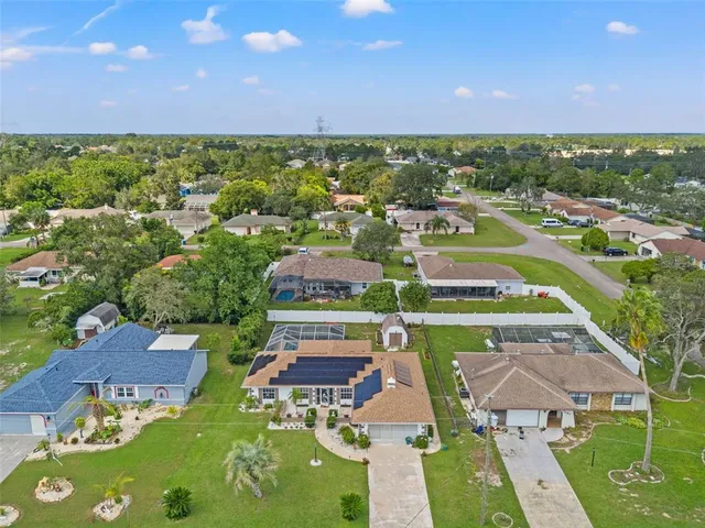 a view of a city with lawn chairs