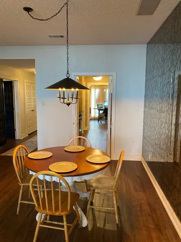 a table and chairs in a room