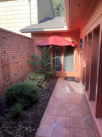 a view of a pathway with a house