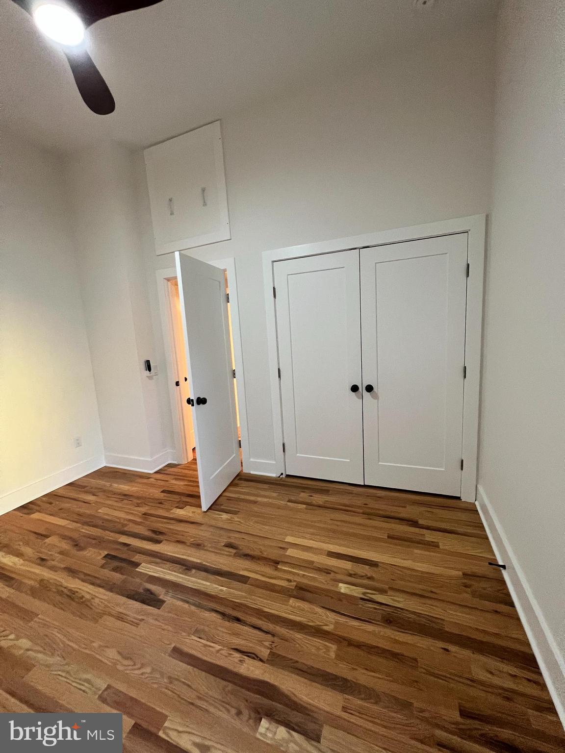 106 East Broad Street, Unit 2 Burlington, NJ 08016 - Photo 13 of 13 a view of empty room with wooden floor
