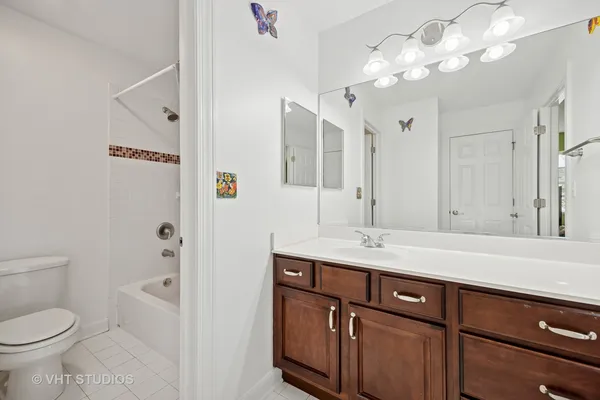 a bedroom with a bed furniture and a window