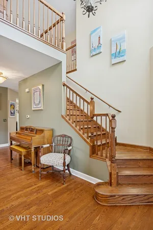 a view of staircase with furniture and rug