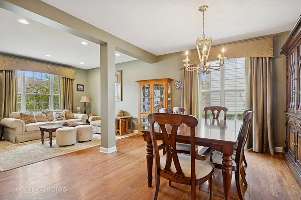 a view of a dining room with furniture window and outside view