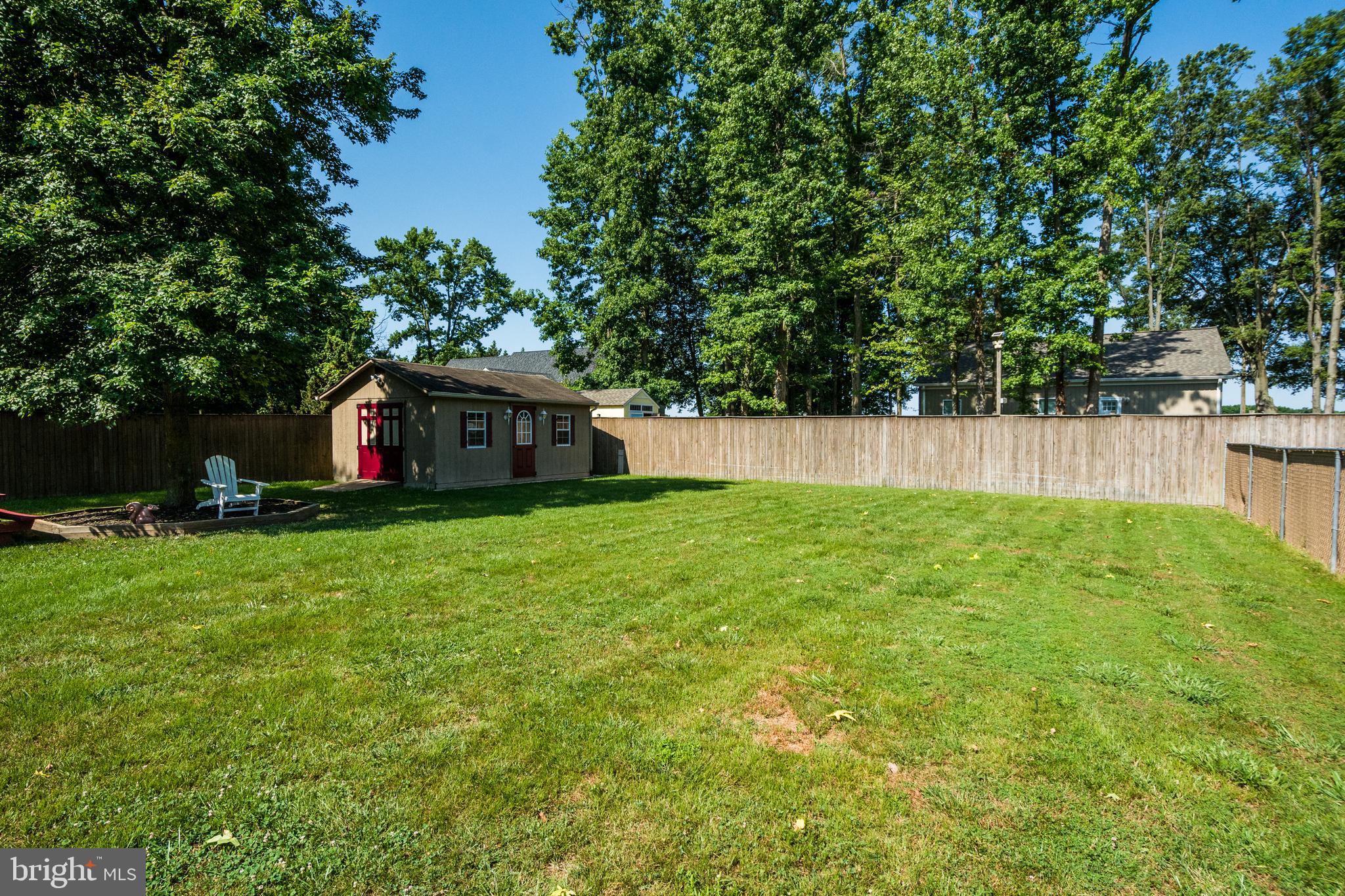 809 Mason Road Stevensville, MD 21666 - Photo 35 of 49 Rear fenced yard (view 2) Shed to left rear