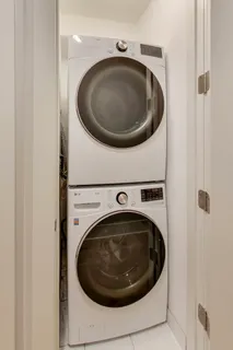 a view of a building with a swimming pool and outdoor space