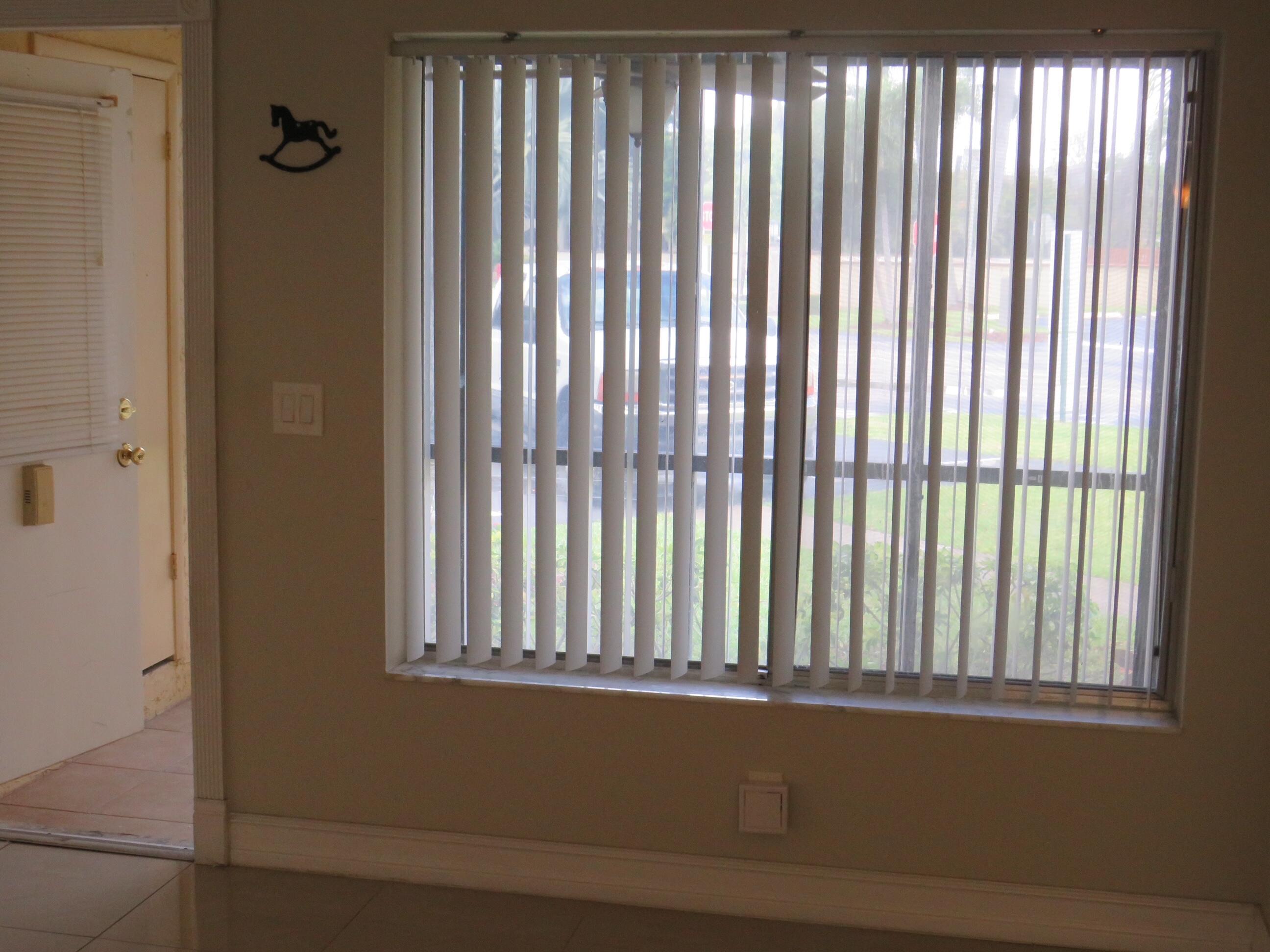 335 Pine Ridge Circle, Unit D1 Greenacres, FL 33463 - Photo 26 of 30 a view of a balcony