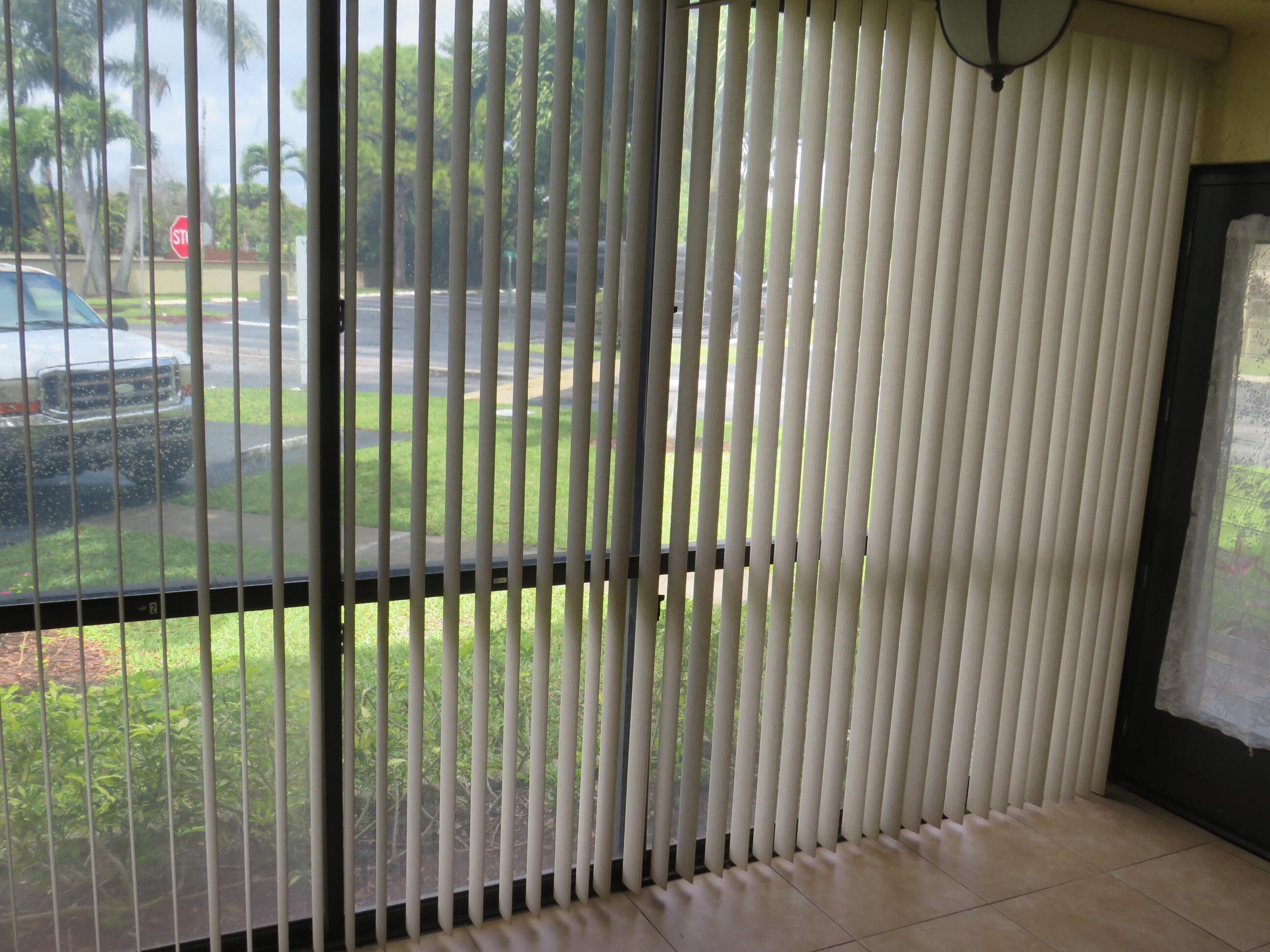 335 Pine Ridge Circle, Unit D1 Greenacres, FL 33463 - Photo 3 of 30 a view of a balcony