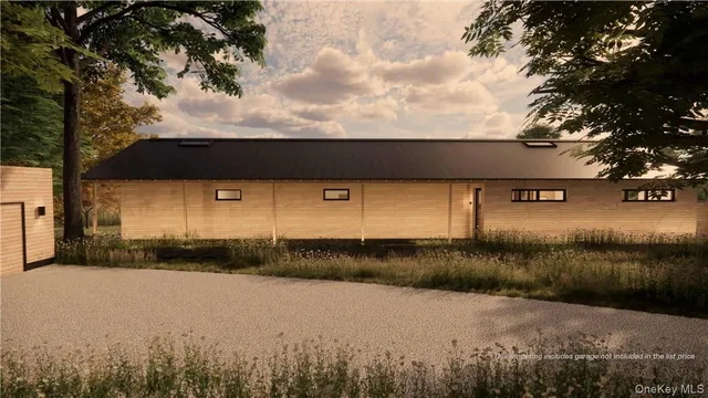 a view of a back yard of the house and trees