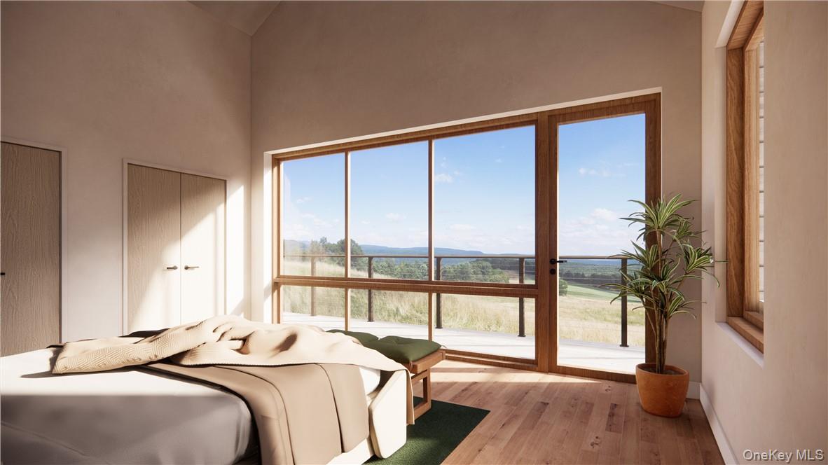 10 Red Rock Road Wawarsing, NY 12489 - Photo 5 of 23 a bedroom with a large bed and a large window with balcony view