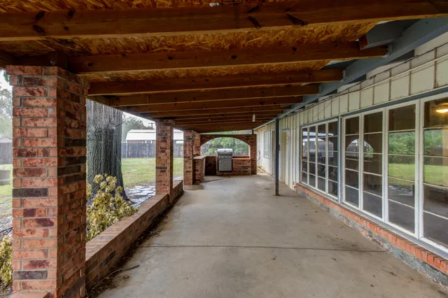 a view of a room with wooden walls