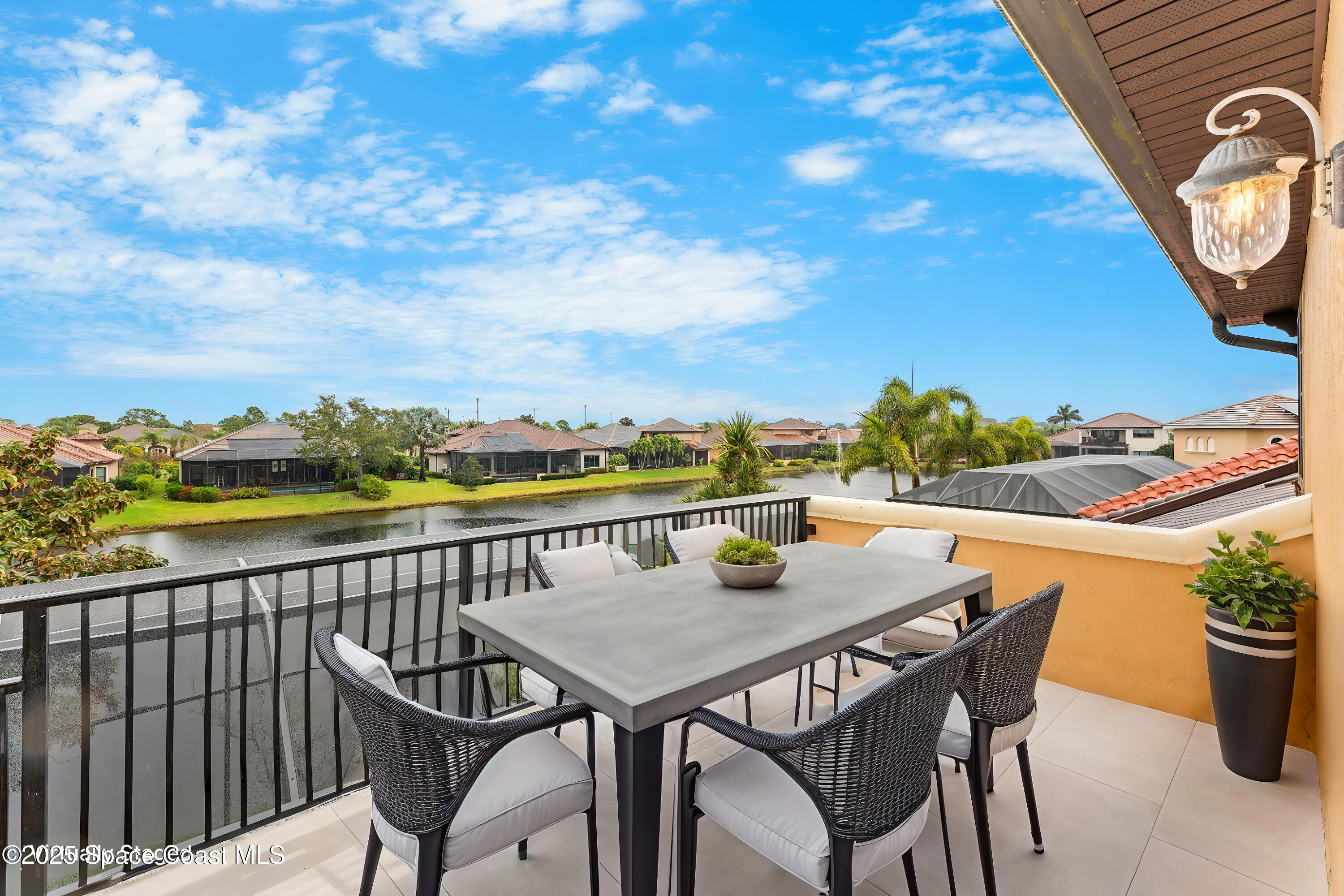 6205 Anello Drive Melbourne, FL 32940 - Photo 28 of 49 a view of city from balcony with furniture