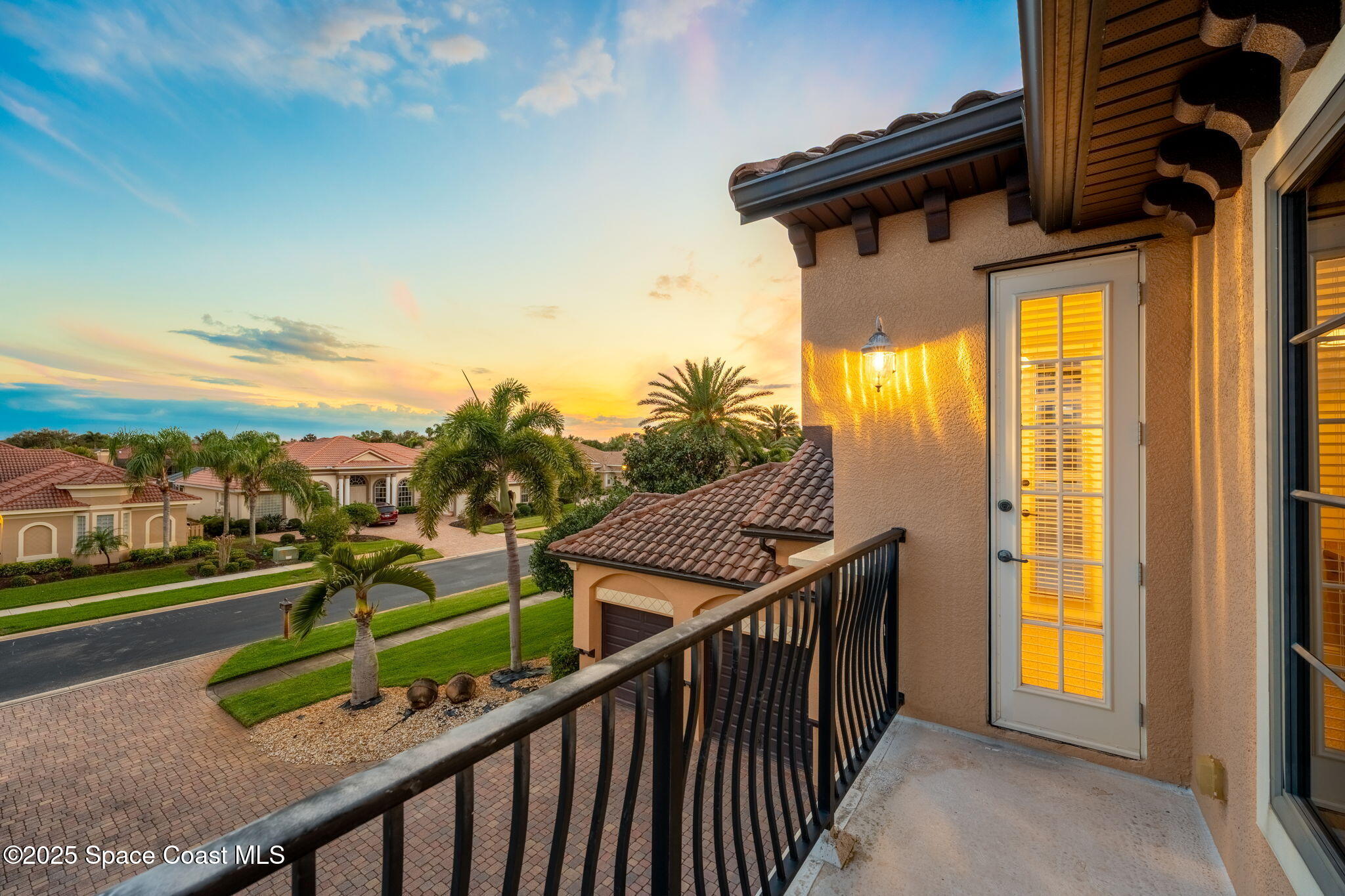 6205 Anello Drive Melbourne, FL 32940 - Photo 34 of 49 a view of a street with an outdoor seating