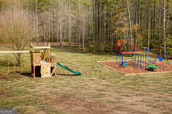 a house that has a big yard in front of it