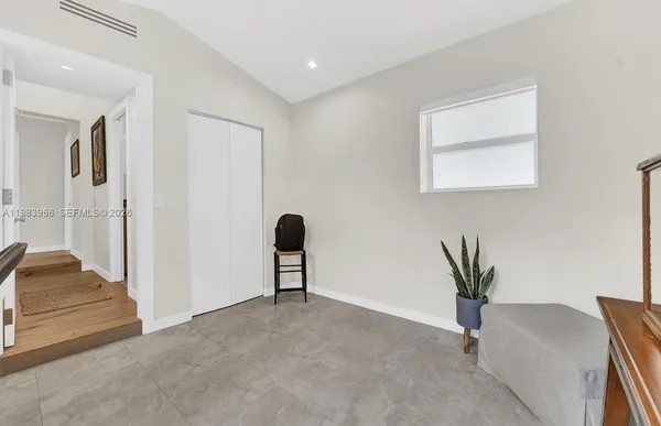 a view of livingroom with furniture and entryway