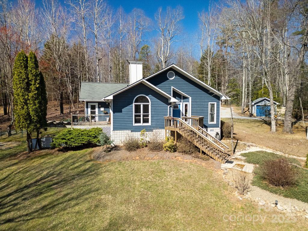 1881 Becky Mountain Road Brevard, NC 28712 - Photo 2 of 40 a view of a house with backyard and sitting area