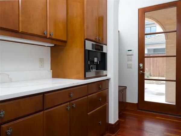 a kitchen with a sink and a window