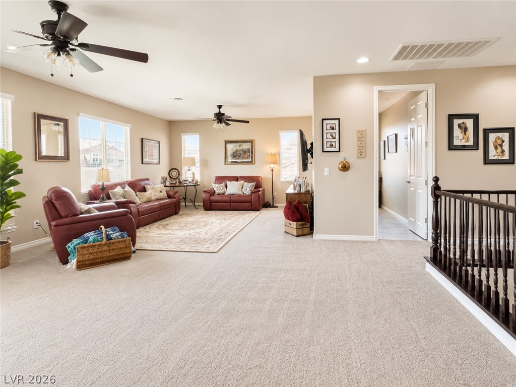 9724 University Ridge Avenue Las Vegas, NV 89149 - Photo 59 of 61 A generously sized living area offers comfort and ample room for gatherings.