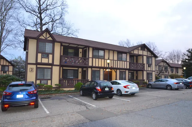 a car parked in front of a house
