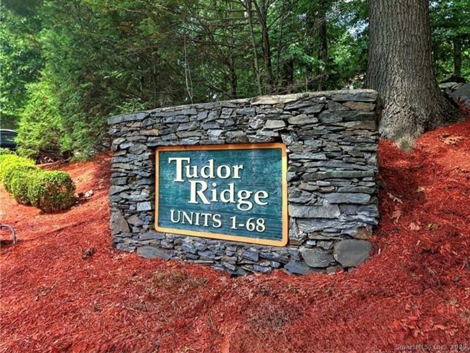 125 Warner Hill Road, Unit 27 Stratford, CT 06614 - Photo 2 of 18 a sign on the side of a road