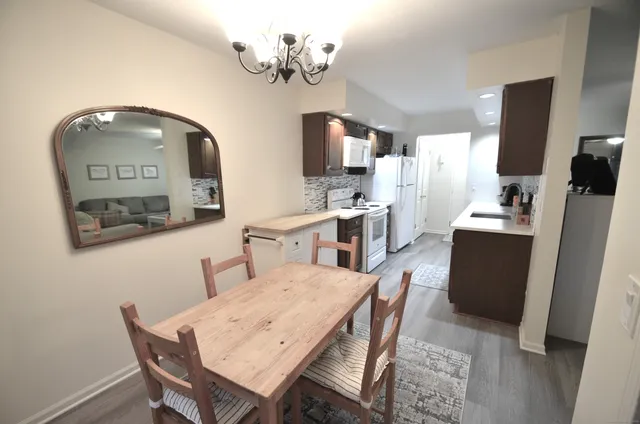 a view of a dining room with furniture