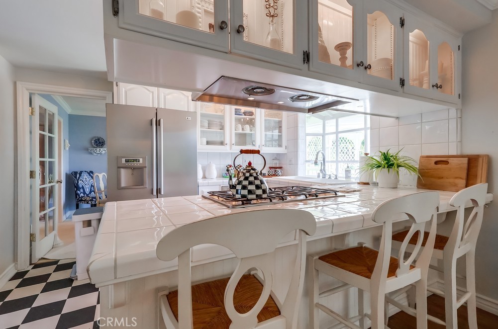 835 Statler Street San Pedro, CA 90731 - Photo 12 of 35 a view of a dining room with furniture and chandelier