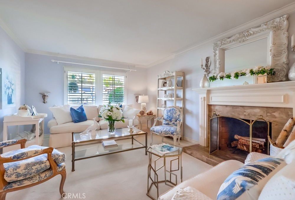 835 Statler Street San Pedro, CA 90731 - Photo 4 of 35 a living room with furniture and a fireplace