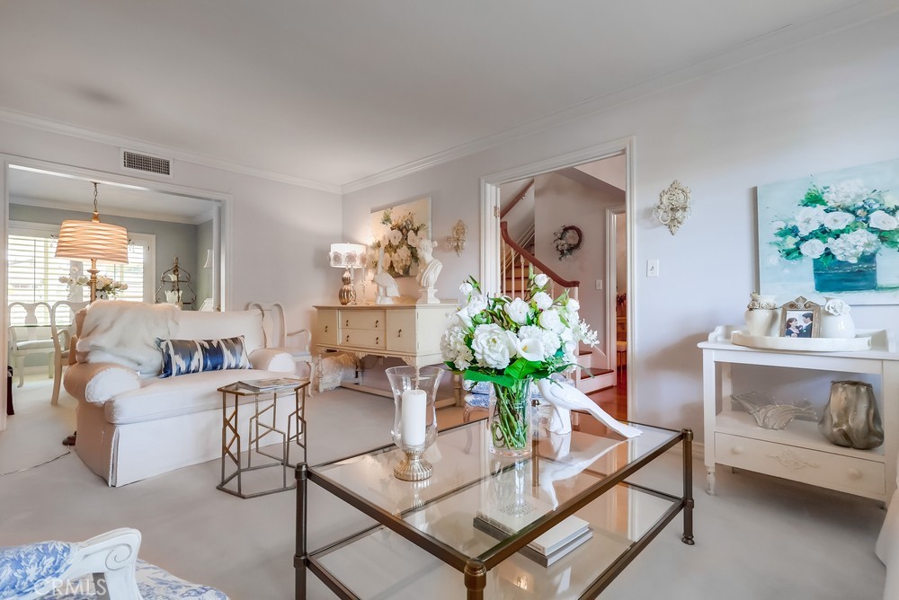 835 Statler Street San Pedro, CA 90731 - Photo 6 of 35 a living room with furniture potted plant and a mirror