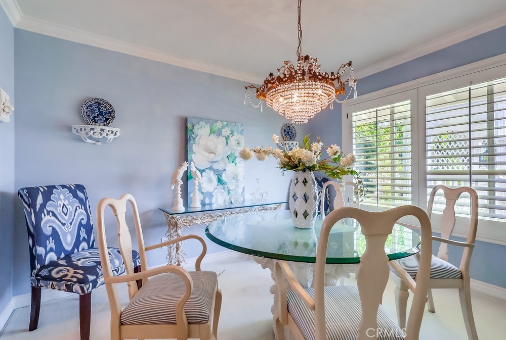 835 Statler Street San Pedro, CA 90731 - Photo 7 of 35 a view of a dining room with furniture chandelier and wooden floor