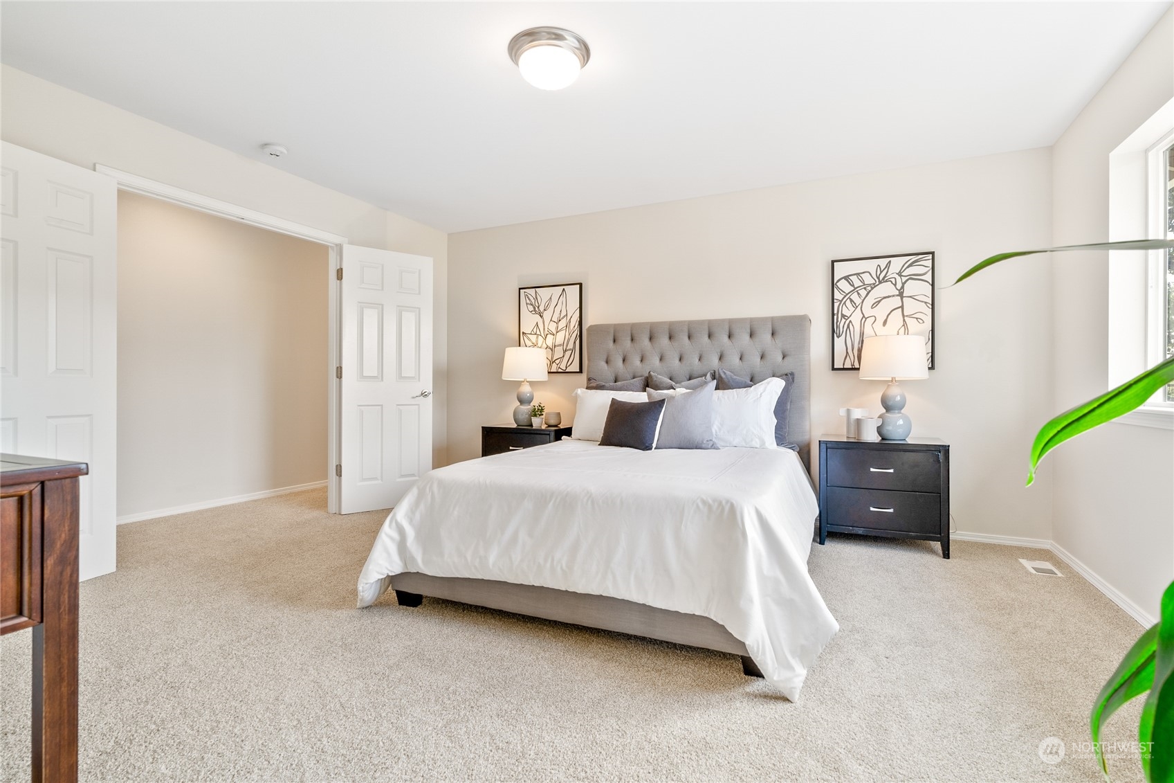 1730 Southeast 30th Place Renton, WA 98055 - Photo 16 of 31 a bed room with a bed and a night stand