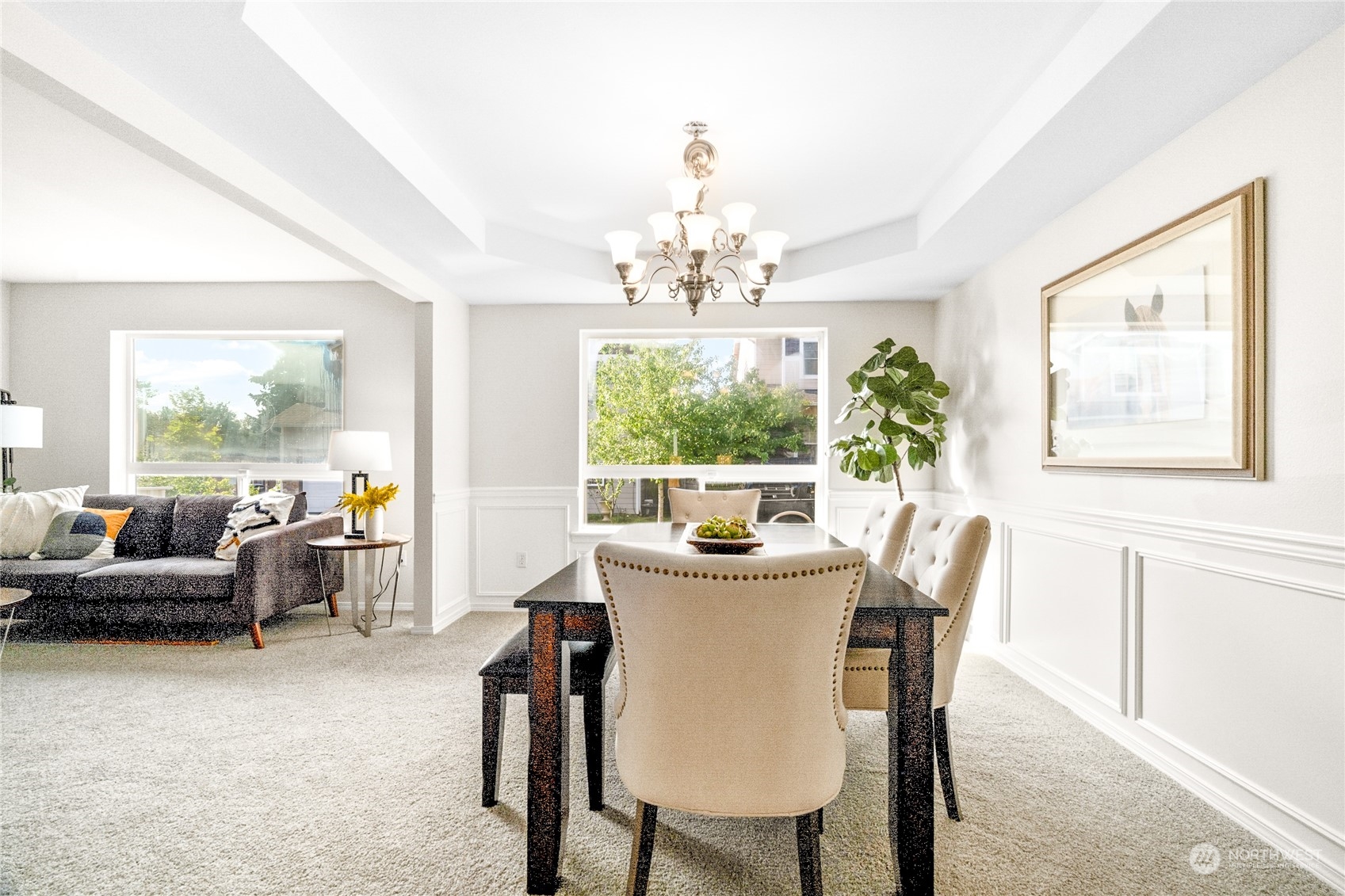 1730 Southeast 30th Place Renton, WA 98055 - Photo 6 of 31 a view of a dining room with furniture a chandelier and a window