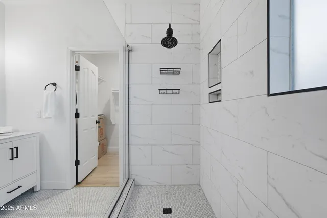 a room with gym equipment and a window