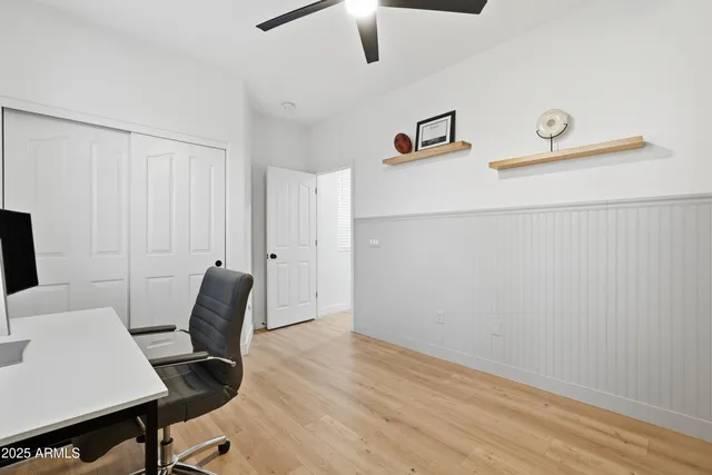 a view of storage and utility room with washer and dryer