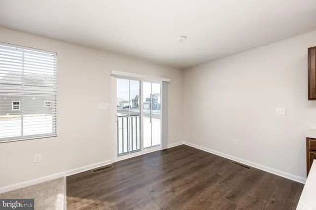 an empty room with an entryway