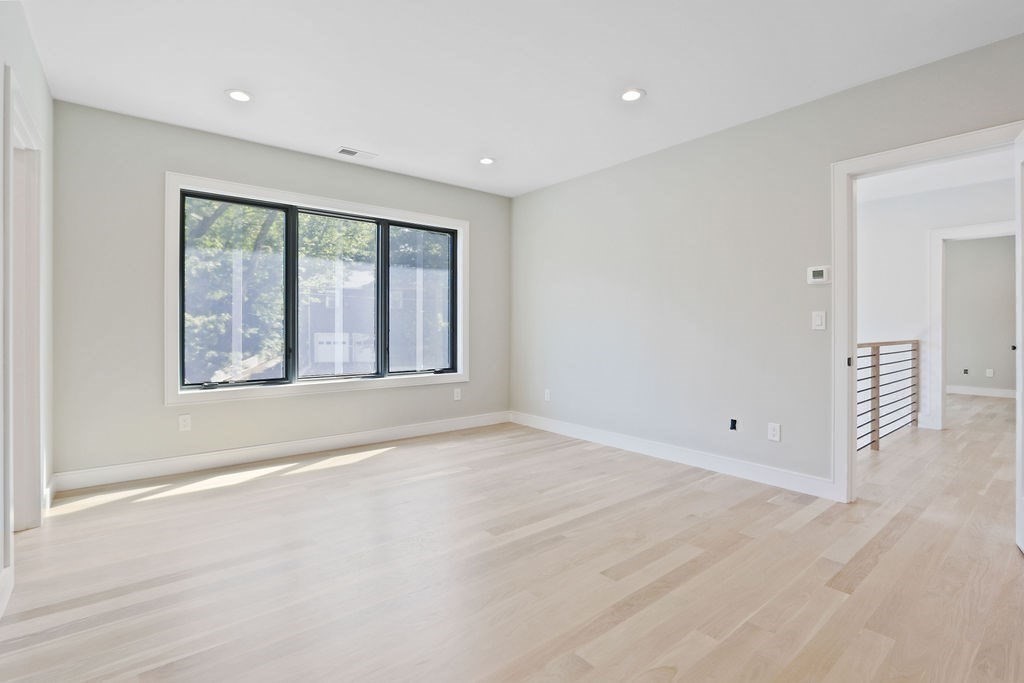 216 Greendale Avenue Needham, MA 02494 - Photo 28 of 40 a view of an empty room with a window