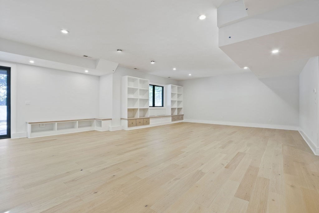 216 Greendale Avenue Needham, MA 02494 - Photo 30 of 40 an empty room with cabinet and mirrors