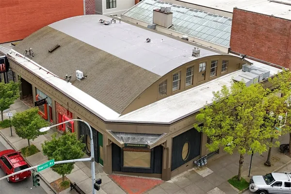a aerial view of a house with a yard