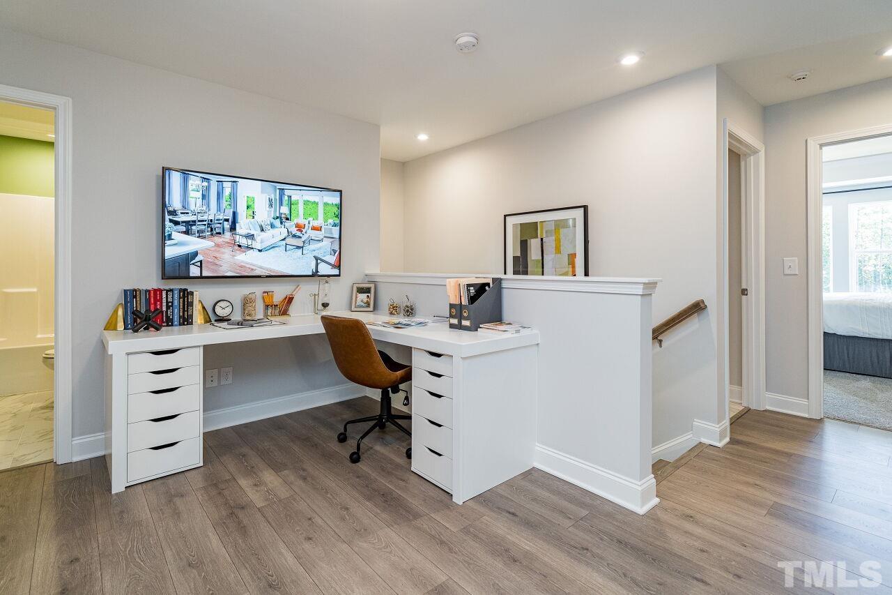 3107 Dunnock Drive, Unit 6 Durham, NC 27713 - Photo 24 of 27 a workspace with furniture and window