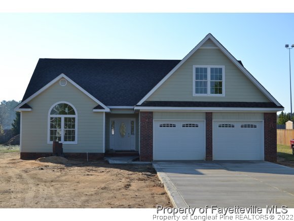 9628 Lukes Run Road Linden, NC 28356 - Photo 1 of 25 a house view with a outdoor space