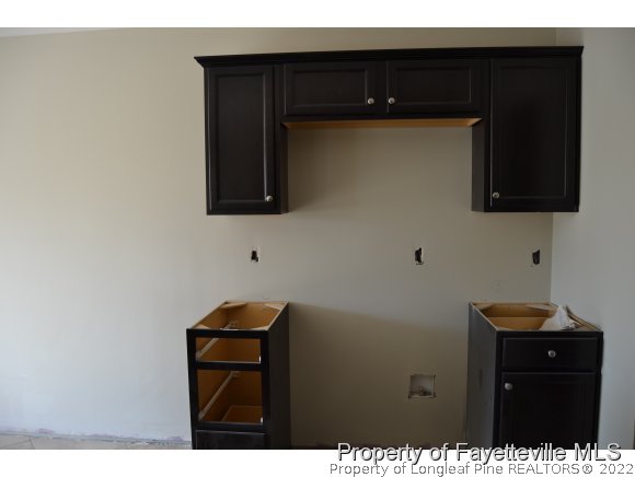 9628 Lukes Run Road Linden, NC 28356 - Photo 13 of 25 a bathroom with a sink and a mirror