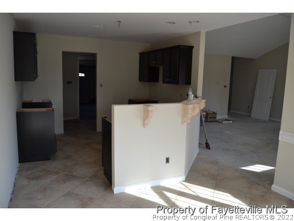 9628 Lukes Run Road Linden, NC 28356 - Photo 14 of 25 a view of a hallway with workspace