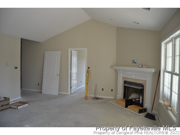 9628 Lukes Run Road Linden, NC 28356 - Photo 15 of 25 a view of an empty room and a fireplace