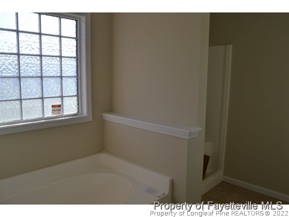 9628 Lukes Run Road Linden, NC 28356 - Photo 17 of 25 a view of an empty room with a window